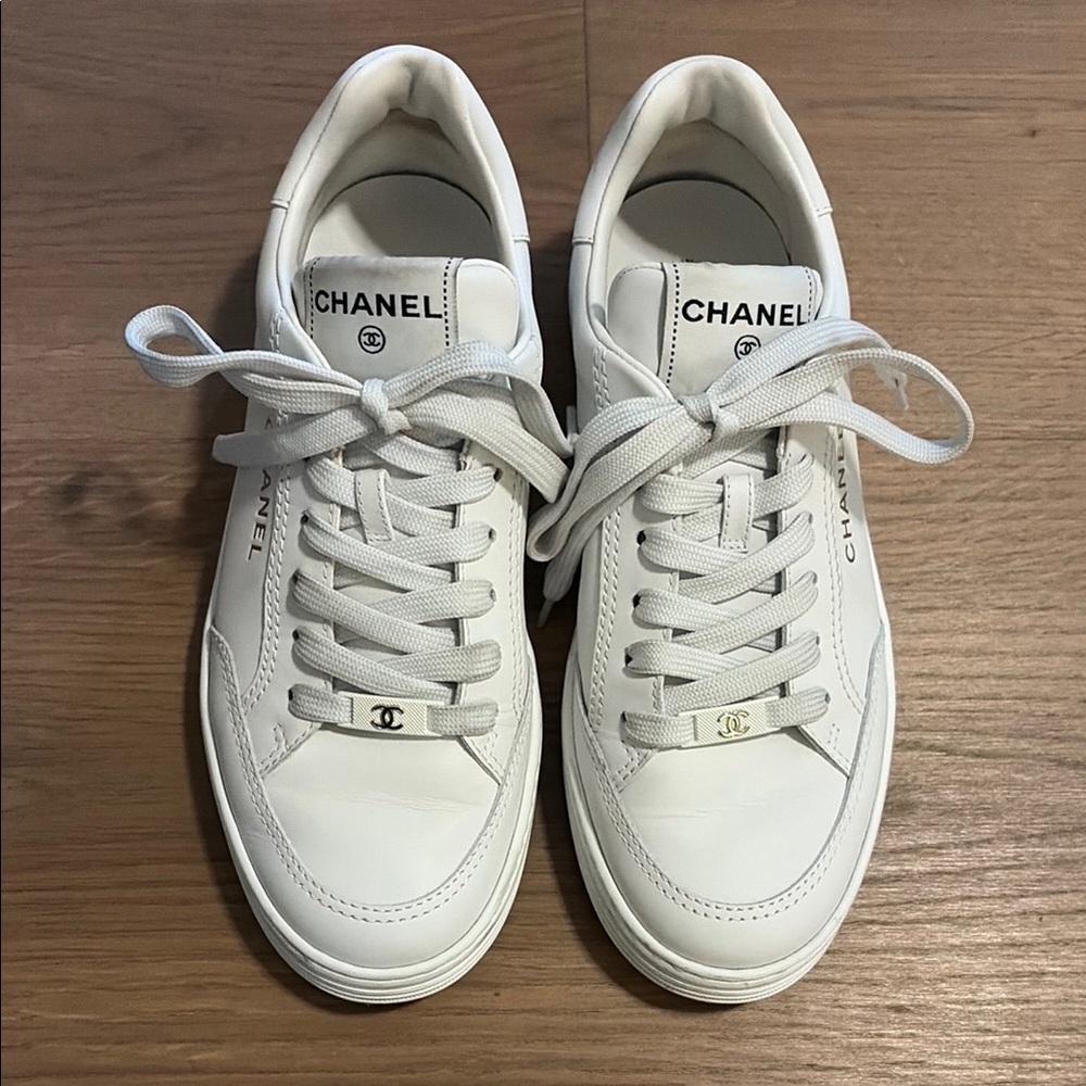 CHANEL White Leather Low-Top Sneakers - Women's